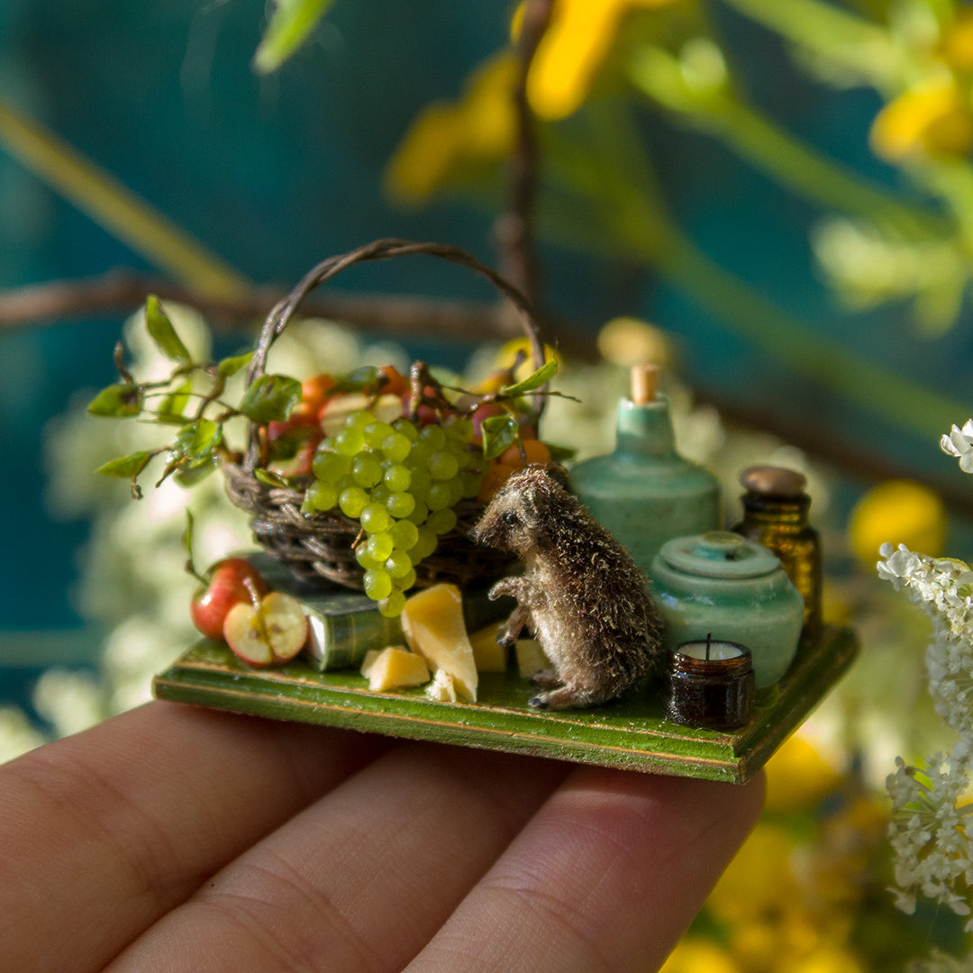 Miniature hedgehog picnic with fruit basket for dollhouse in 1:12 scale