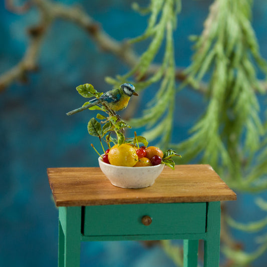 Miniature blue tit on a plate with fruits and berries for a dollhouse, scale 1:12. - Rina Vellichor