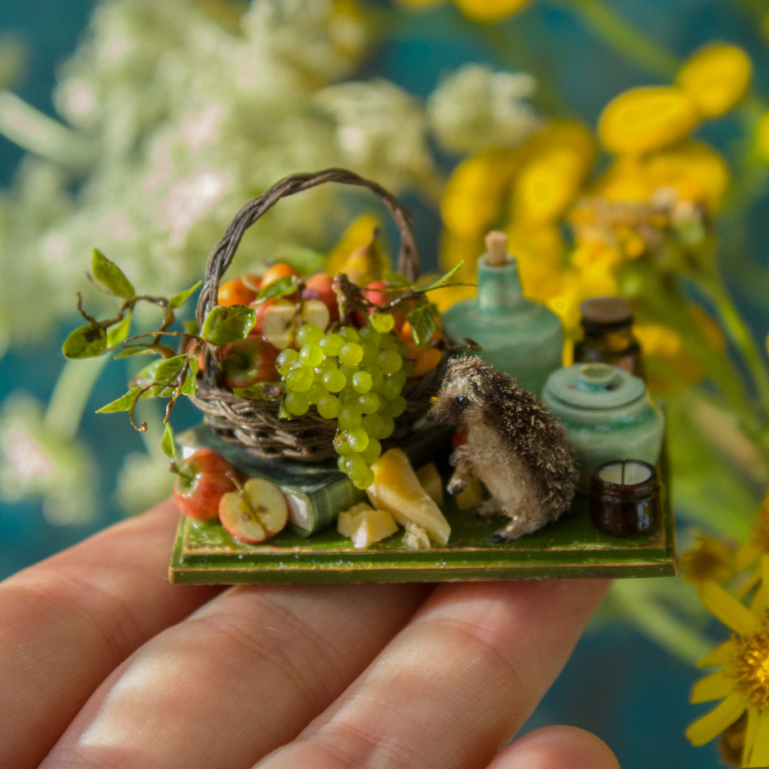Miniature hedgehog picnic with fruit basket for dollhouse in 1:12 scale