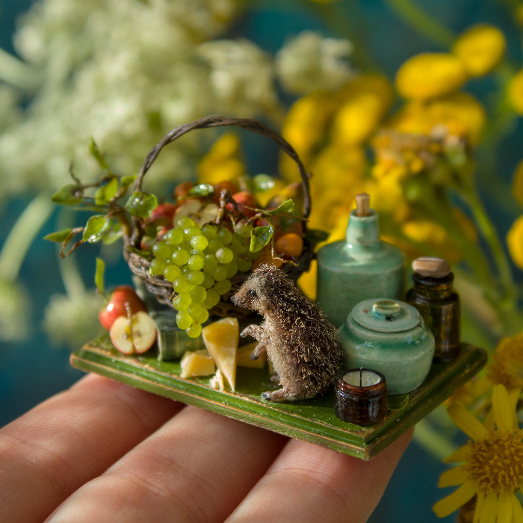 Miniature hedgehog picnic with fruit basket for dollhouse in 1:12 scale