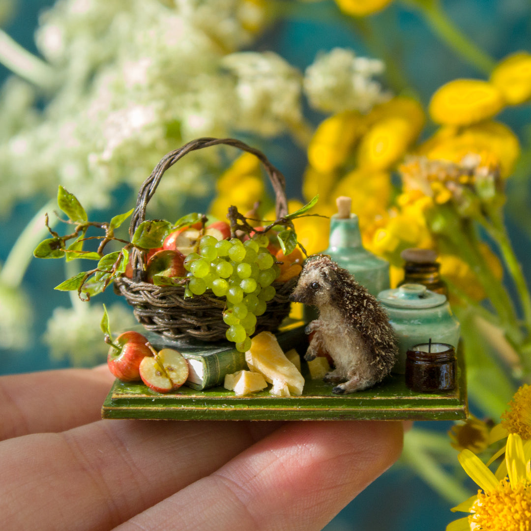 Miniature hedgehog picnic with fruit basket for dollhouse in 1:12 scale