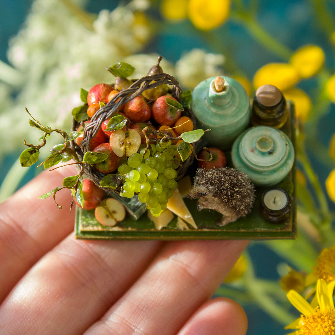 Miniature hedgehog picnic with fruit basket for dollhouse in 1:12 scale
