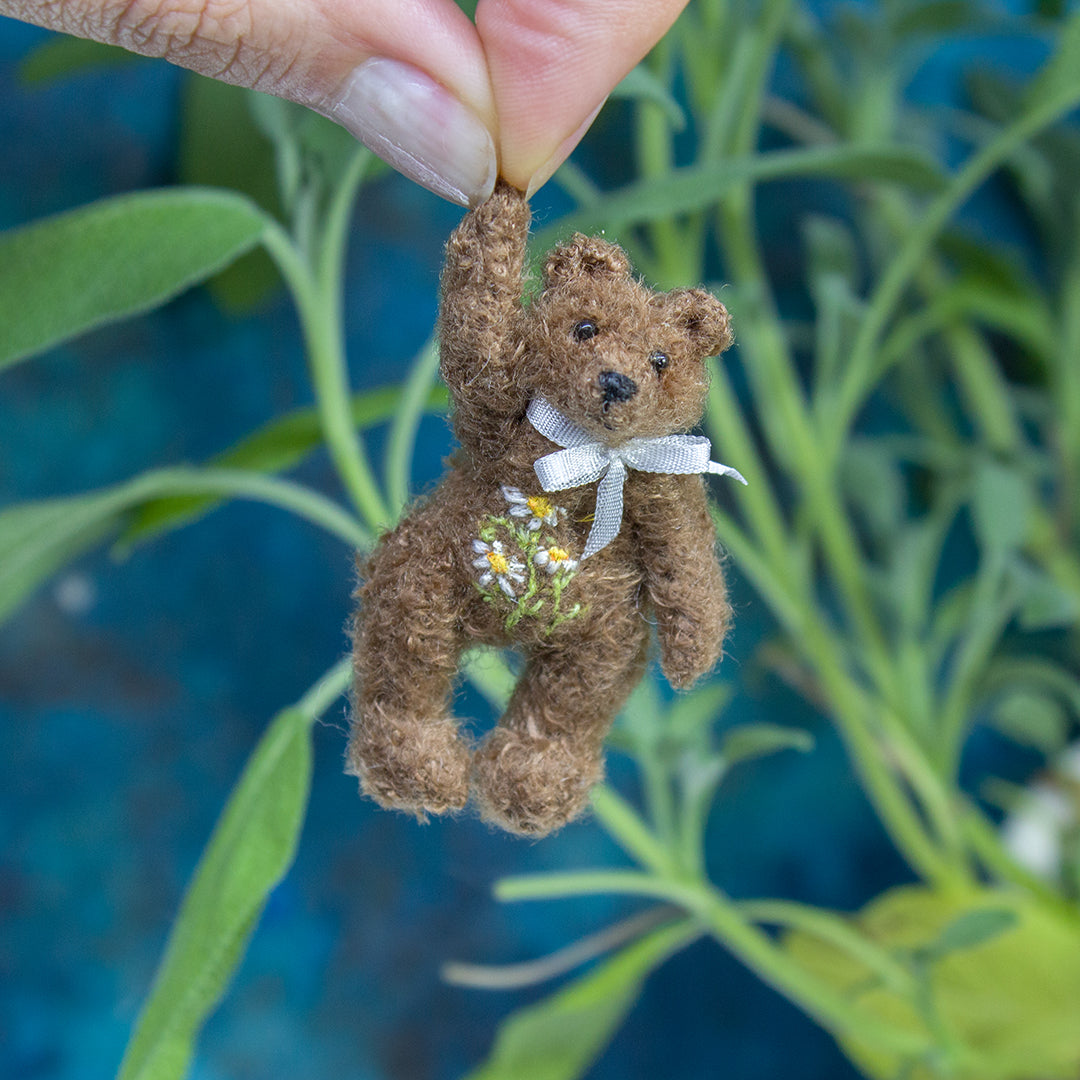 Miniature teddy bear with floral embroidery for dollhouse in 1:12 scale