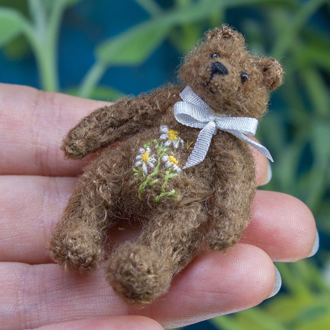 Miniature teddy bear with floral embroidery for dollhouse in 1:12 scale