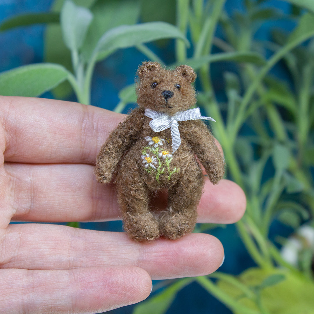Miniature teddy bear with floral embroidery for dollhouse in 1:12 scale